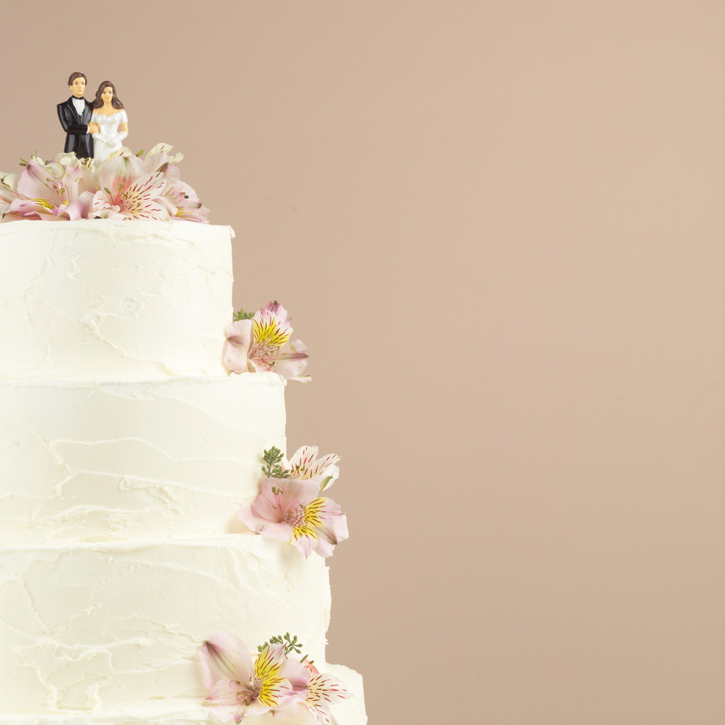 Wedding Cake with pink flowers.